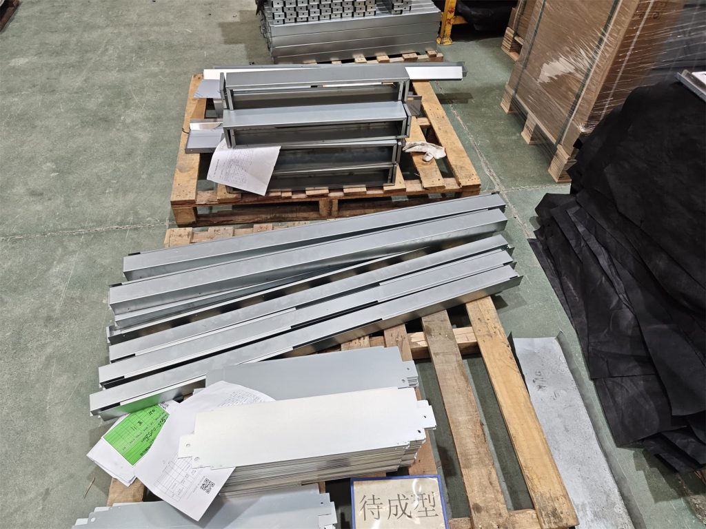 The sheet metal parts of the barbecue grill that are currently being processed.