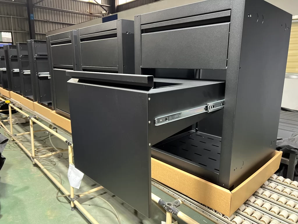 Finished black metal drawer cabinet with smooth slide-out drawer assembly