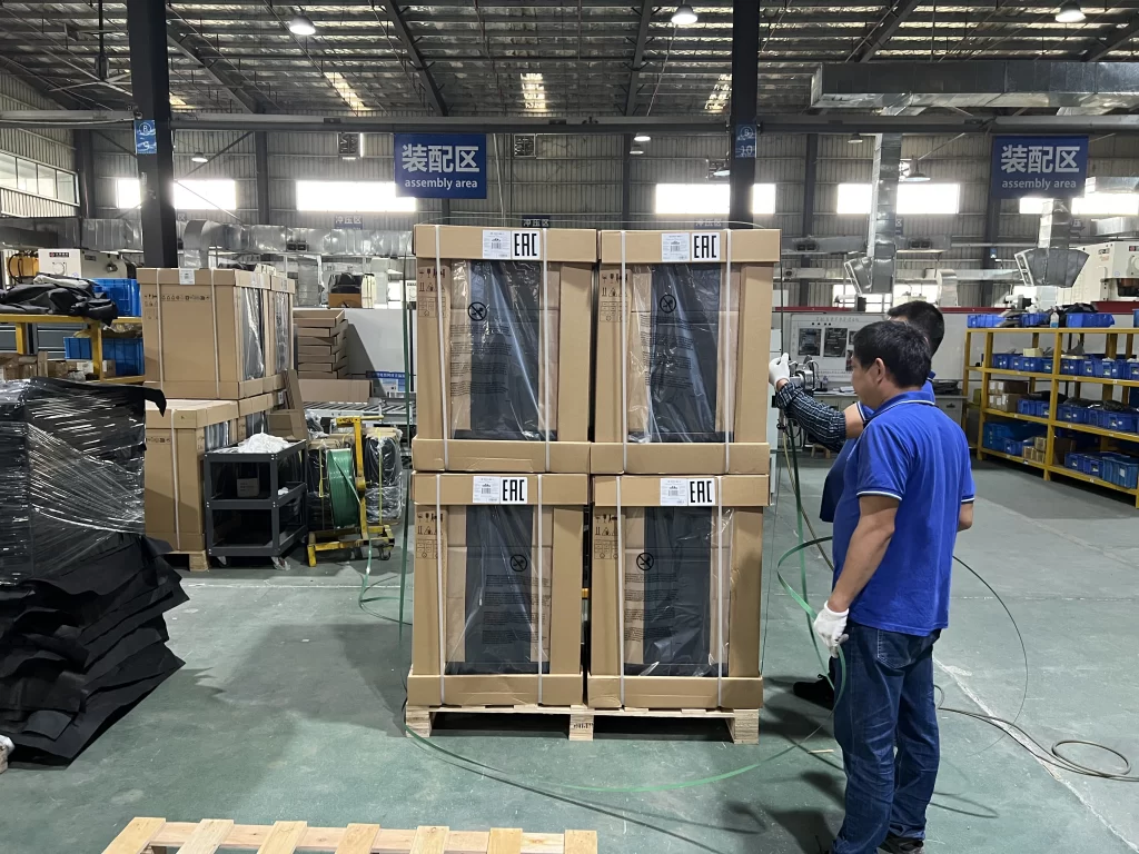 Packaged OEM metal drawer units prepared for batch shipment in the assembly area