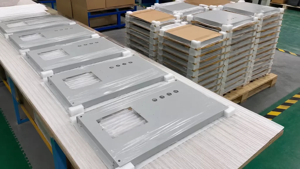 Inspect, package, and ship in batches after powder coating on metal panels