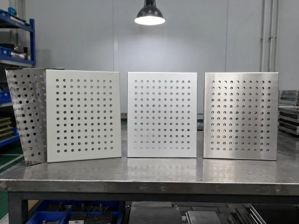 Perforated sheet metal parts with powder coating, anodizing, and passivation surface treatments.